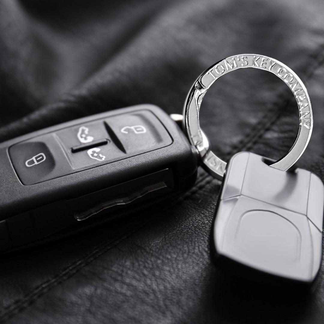 4 Piece Gift Bundle for Car Owners: Magnetic Key Storage Box, Premium Metal Key Rings, Tile Key Finder, Window Breaker & Seatbelt Cutter